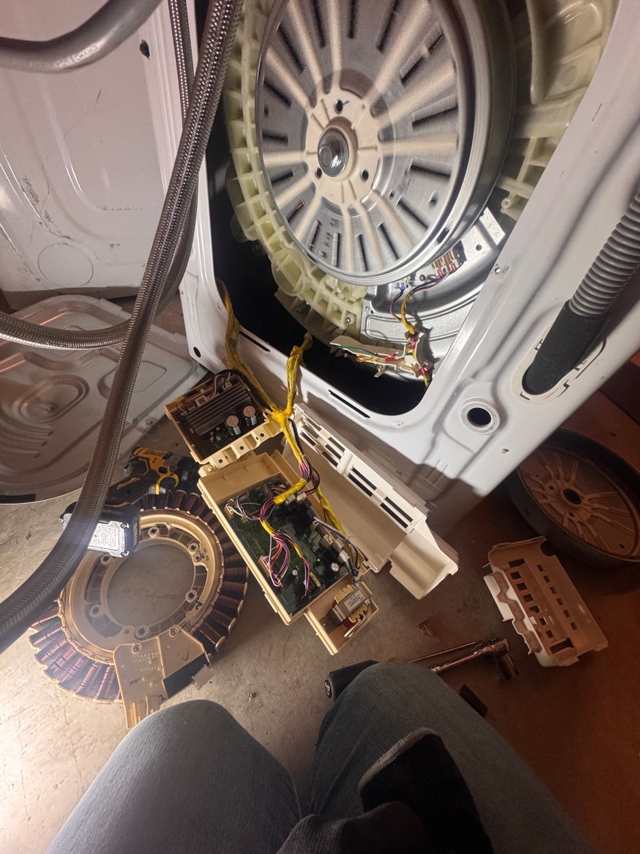 Front-load washer motor and board fully disassembled